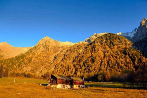 Mountain landscape with hut in autumn