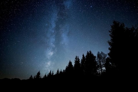 Milky Way over the mountains and forest at Schwagalp