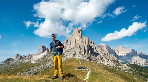 Hiker above Passo Giau