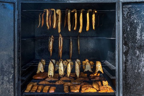 Smoked fish fillets in the smoking cabinet at the river Dahme