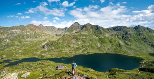Hiker on the way to the mountain hut Ignaz-Mattis-Hutte