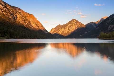 Mountains at lake Heiterwanger See in the evening light