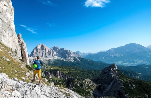 Hiker on footpath to the Nuvolau