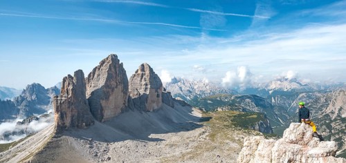 Hiker at the summit of the Paternkofel