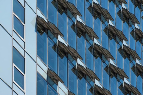 Ventilation flaps on windows in skyscraper facade