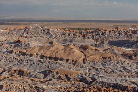Bizarre red rock formations with white salt