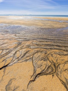 Sand structure with ripple at low tide