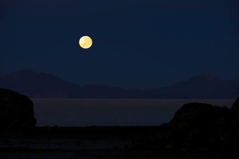 Full moon setting at dawn