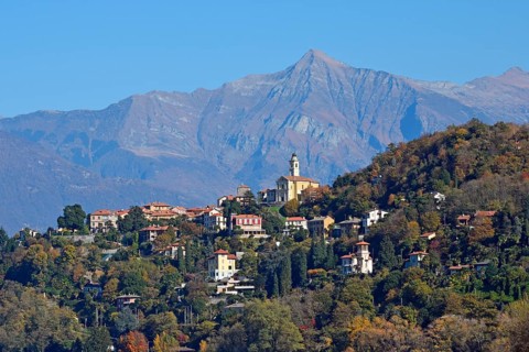 The town Pino sulla Sponda del Lago Maggiore and peak Pizzo di Vogorno