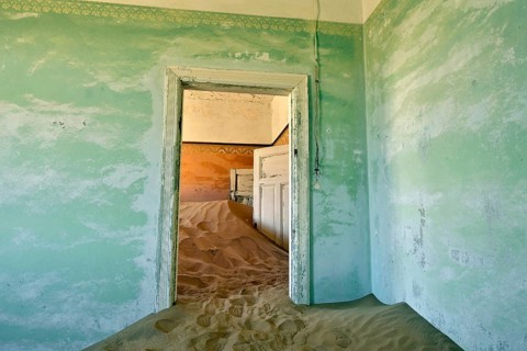 Desert sand in the ruined building of the former diamond city