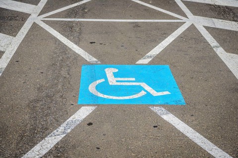 Sign for disabled parking on the ground