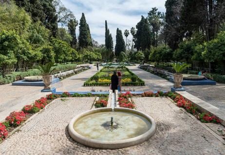 City park with fountain and flowers