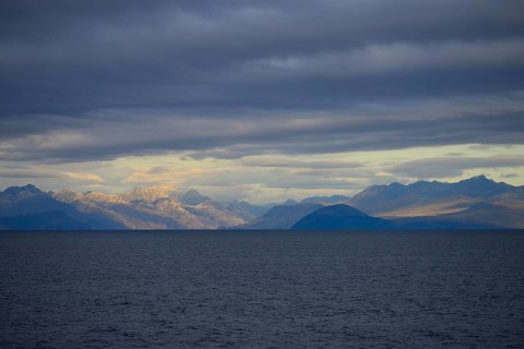 Coastal landscape with dark clouds
