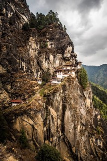 Buddhist tiger nest monastery Taktshang on steep rock face