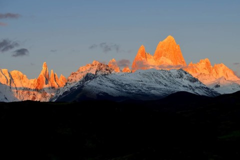 Snow-covered mountain range of the Fitz Roy and Cerro Torre at sunrise