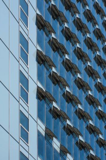 Ventilation flaps on windows in skyscraper facade