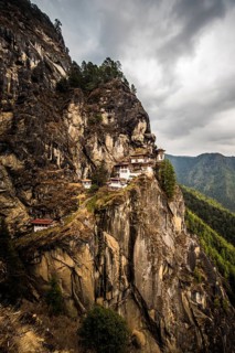 Buddhist tiger nest monastery Taktshang on steep rock face