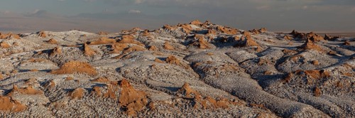 Bizarre red rock formations with white salt