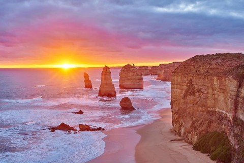 Rocky coast with the Twelve Apostles at sunset