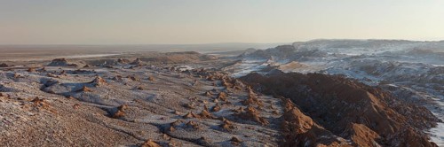 Bizarre red rock formations with white salt