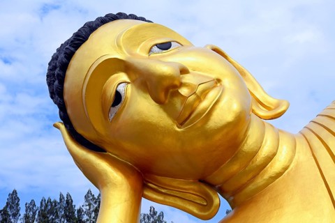 Lying golden Buddha in the temple Wat Sri Sunthon