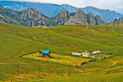 Landscape with dacha and yurts