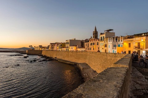 Waterfront in the coastal town of Alghero after sunset