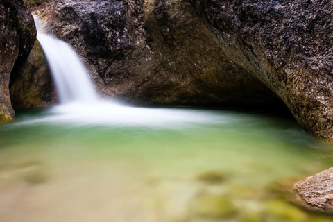 Almbach gorge with waterfall