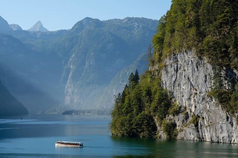 Excursion ship in front of Echowand on Lake Konigssee