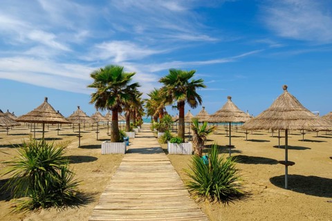 Parasols on the beach in Fushe-Drac near Durres