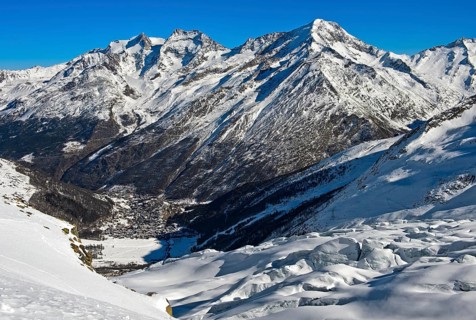 View from the Fee glacier into the valley with winter sports resort Saas-Fee