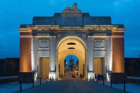 Illuminated Menin Gate at dawn