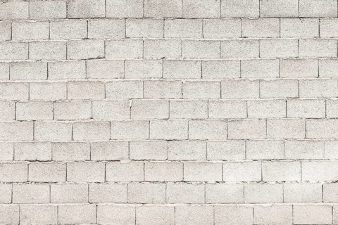 Brick-built wall of gray expanded clay stones