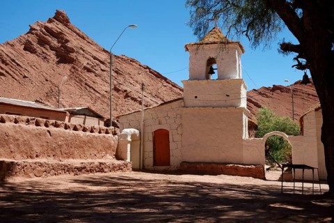 Church in the Adobese style with thatched roof