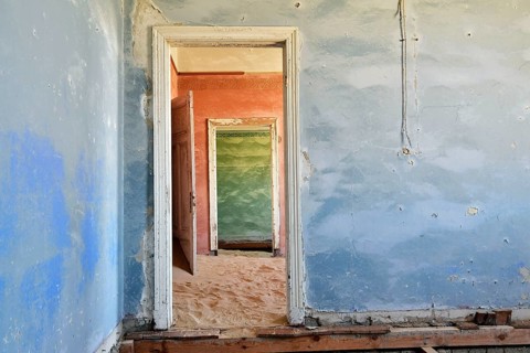 Desert sand in the ruined building of the former diamond city