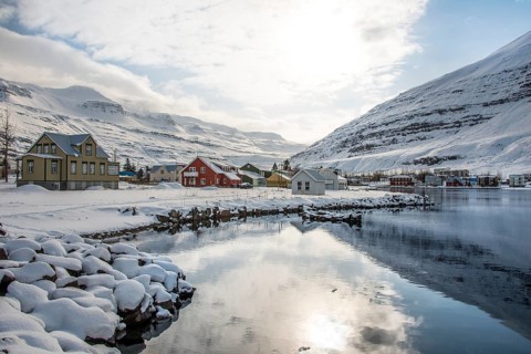 View over the village Seyoisfjorour with snow