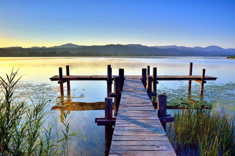 Wooden pier in the morning light at Pfaffikersee