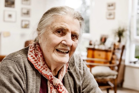 Senior citizen in her room in a senior citizen's home
