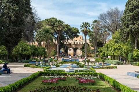 City park with fountain and flowers