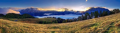 Mountain panorama Berchtesgarden Alps with Watzmann east face and Steinernes Meer at sunset