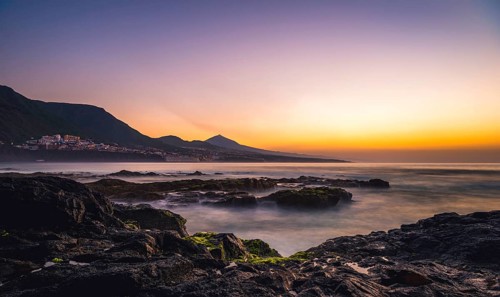 Rocky coast and sea at sunset