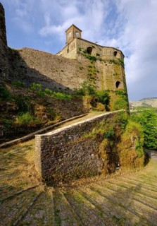 Clock tower on the castle and driveway to the castle