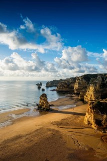 Coloured cliffs and sunrise at the beach