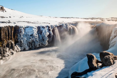 Falling water masses of the Selfoss Waterfall in Winter