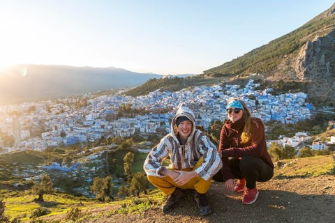 Young couple in Moroccan djellaba at lookout point