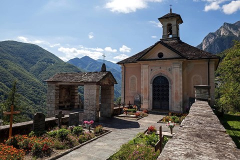 Cemetery with cemetery chapel in the mountain village Isorno