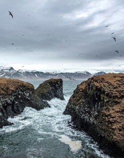 Heavy sea at the coast in a small bay