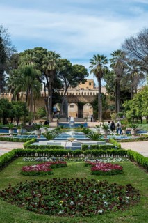 City park with fountain and flowers