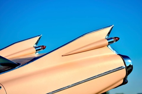 Cadillac shark fins in blue sky