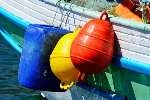 Fishing boat with colourful buoys